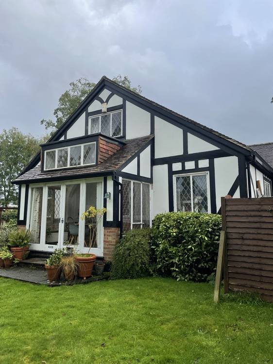 Before — rear elevation Tudor property