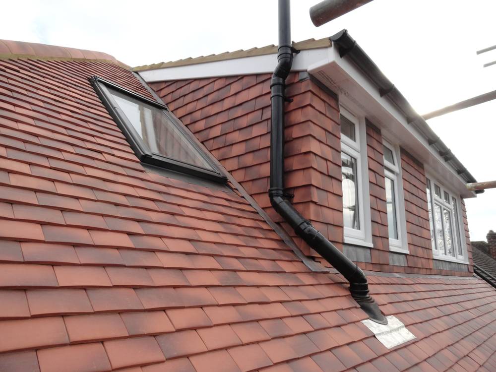 During — hip roof detail with Velux