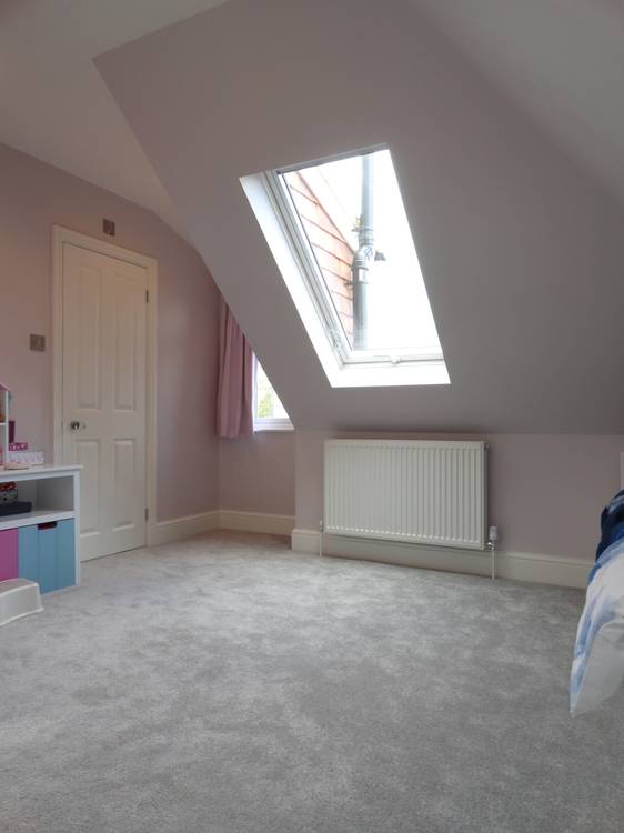 After — loft bedroom with Velux