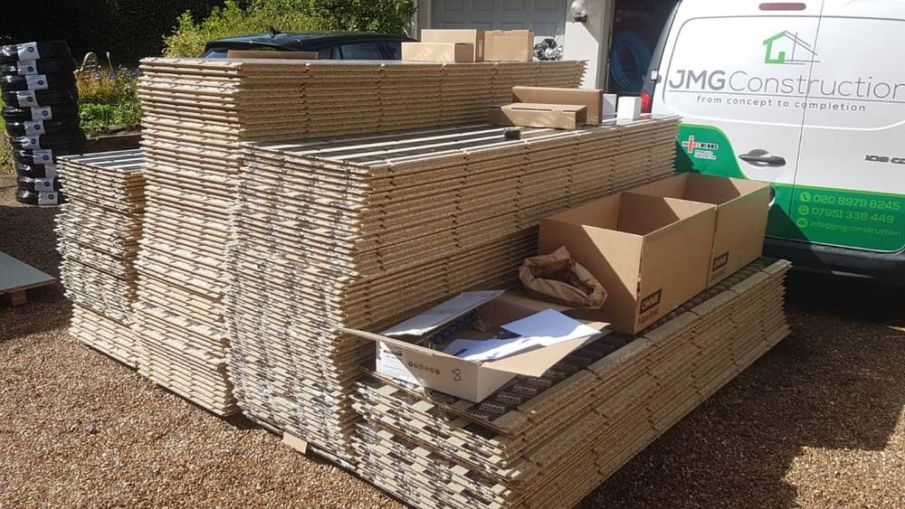 During — roof tiles delivery with JMG van