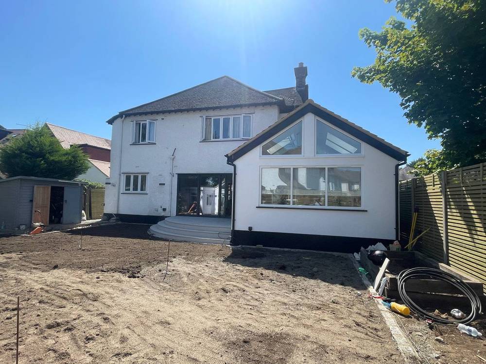After — rear extension with gable glazing and bi-fold doors