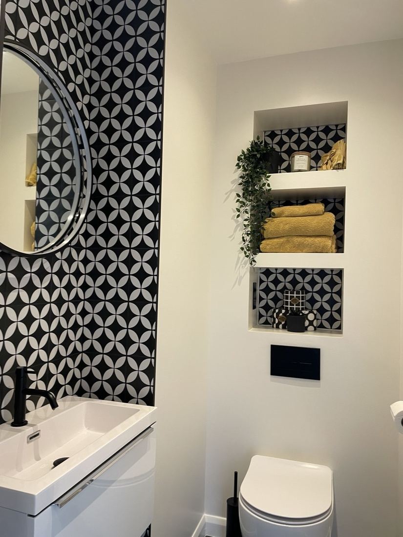 After — bathroom sink and storage niches