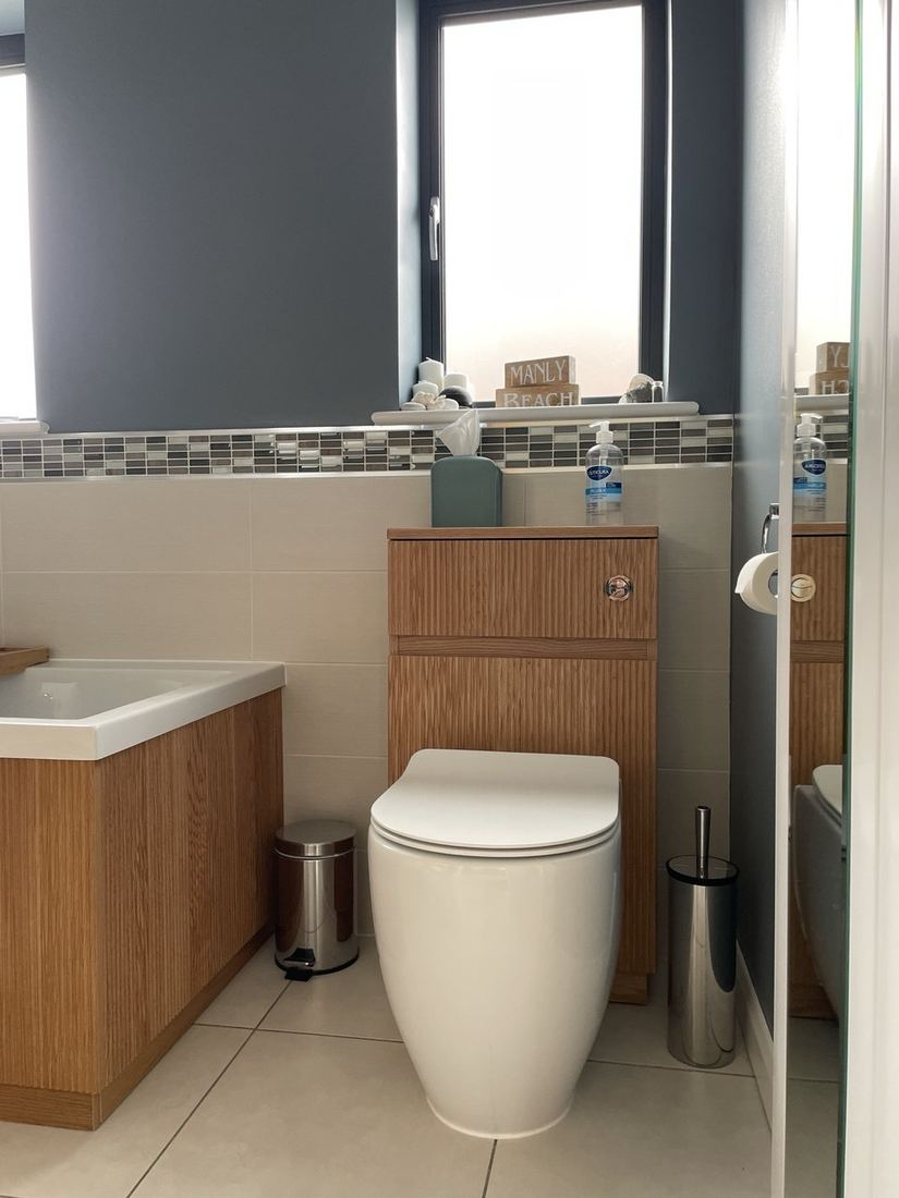 After — cloakroom with oak vanity unit