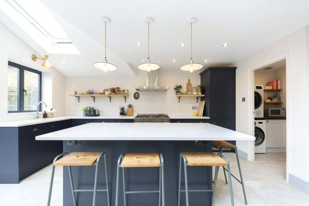 After — kitchen with utility room beyond